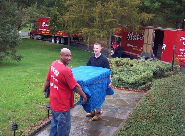 bert hill movers moving a box